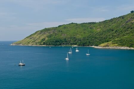 Boat at bay in phuket island, Thailand の写真素材