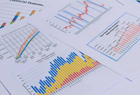 business charts and graphs on background