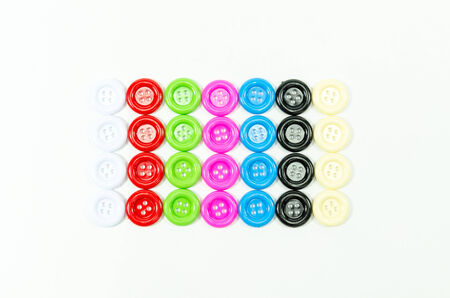 colorful of buttons sewing on white background の写真素材