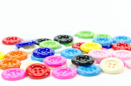 colorful of buttons sewing on white background の写真素材