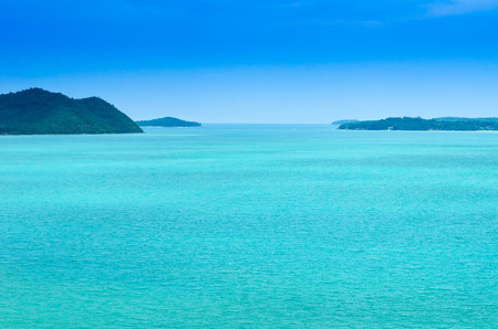 Green sea with blue sky の写真素材