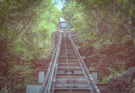 A tram is working to hill at petchburi, thailandの写真素材