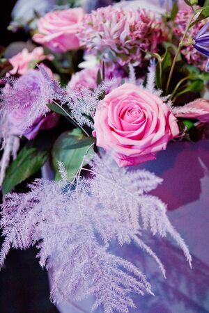 Flower composition with pink roses and other flowersの写真素材