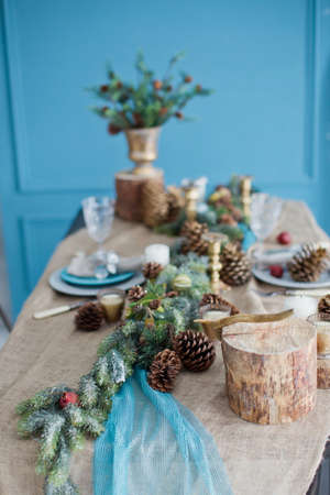 Christmas table with rustic decorationsの写真素材