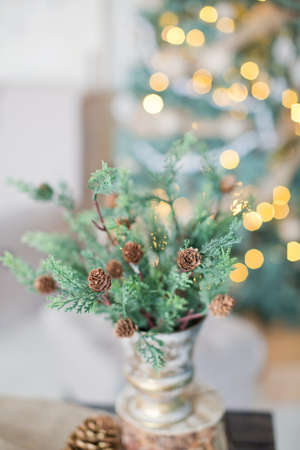 bouquet of twigs with pine conesの写真素材