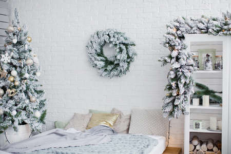 white bedroom with Christmas decorationsの写真素材