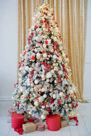 Christmas tree with red and white decorationsの写真素材