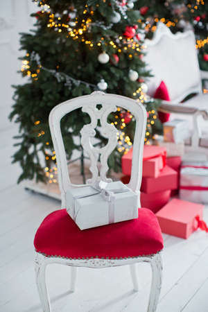 gift boxes near Christmas treeの写真素材