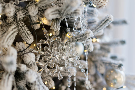 Beautiful white Christmas tree with luxury silver and crystal decorationsの写真素材