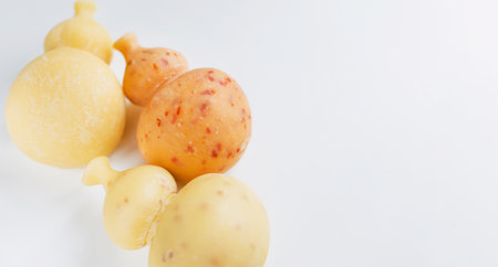 Fresh italian cheese caciocavallo on a white background, copy spaceの写真素材