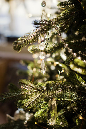 Luxury Christmas tree with glass crystals decorations and lightsの写真素材