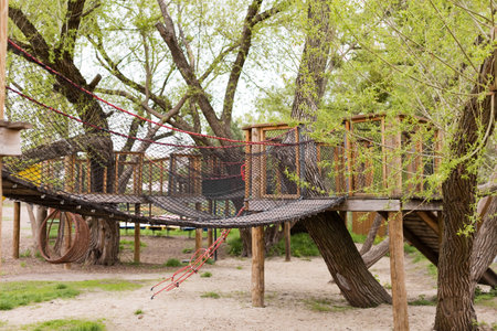 Wooden playground outdoors in the spring parkの写真素材