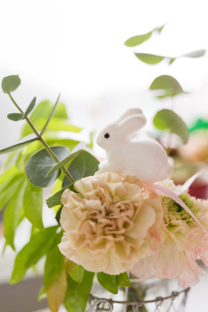 Easter bouquet with white bunny decorationの写真素材