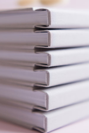 Books in a grey linen fabric cover