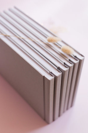 Books in a grey linen fabric cover