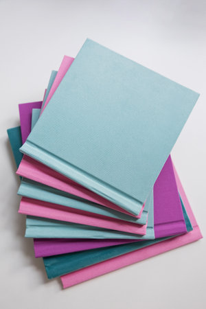 Books in a bright fabric cover