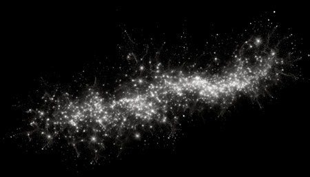 White sparks isolated on a black background. High quality.の素材