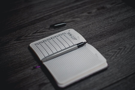 Notepad with a list of cases. High quality photo