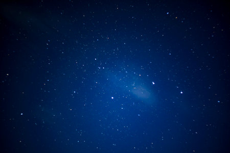 Captivating image of the night sky filled with countless bright stars. The vast expanse of space is...