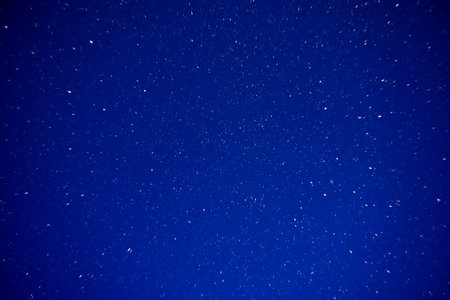 Night sky filled with countless bright stars. The vast expanse of space is beautifully displayed, showcasing the wonders of the universe and the endless possibilities it holdsの写真素材