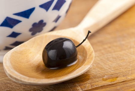 Wooden spoon,  olivesの写真素材