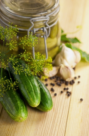 Homemade cucumber preserved in glass jarの写真素材