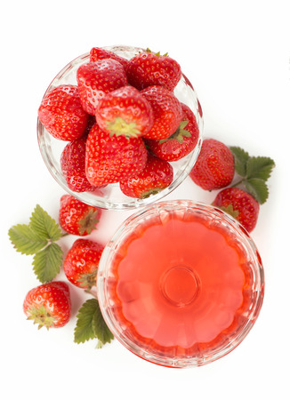 bowl with strawberries and jelly isolated on white backgroundの写真素材
