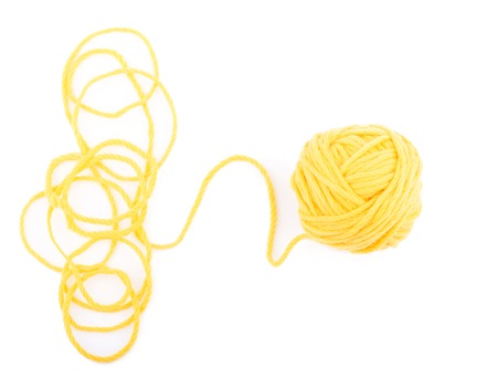 Ball of yarn on the white background