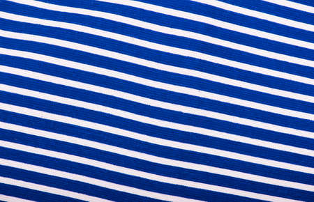 Texture of blue jeans background, ripped jeans.の写真素材