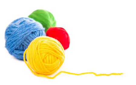needles for knitting on the white backgroundの写真素材