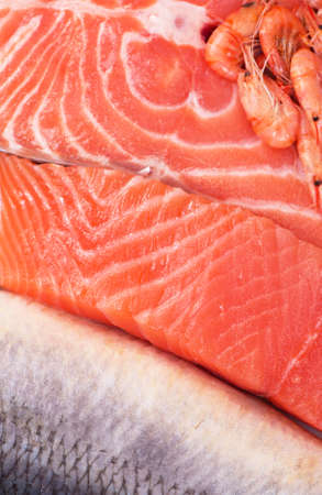 composition consists of chopped pieces of fresh fish and shrimpの写真素材