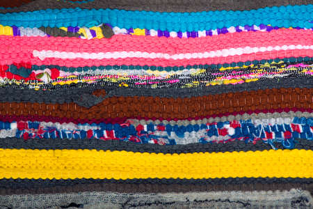 close up of the braided multi colored woollen yarns