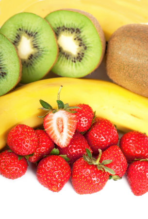 Bananas, kiwi and strawberry lose up isolated on a white backgroundの写真素材