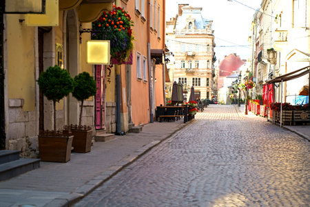 lantern in the middle of an empty square in the city of Lviv, quarantining in the streets of Lvivの写真素材
