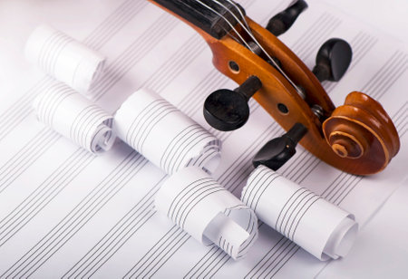 Attributes of the arts.Creative backgroundB postcard. Study violin and crumpled paper of music bookの写真素材