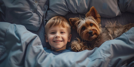 A joyous boy and his furry friend share a special moment under soft blankets. perfect for family and pet themes. A.I.の素材