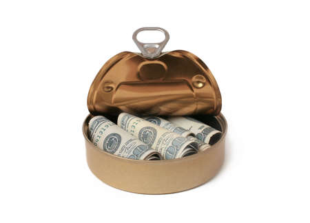 Banknotes hundred dollars curtailed into an open metal canの写真素材