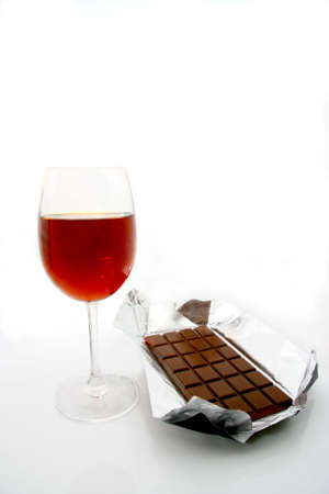 Glass fault and chocolate on a white background.の写真素材