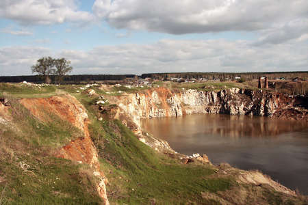 Landscape with the old marble mine filled by water.の写真素材