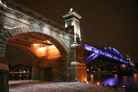  stone bridge at night colour fires in Moscow in the winter.の写真素材