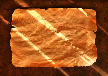 Old crushed paper on brown background