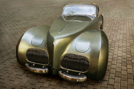 ancient beautiful brilliant car on the area