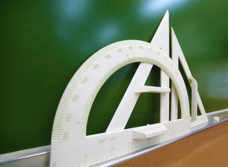 Green school board chalk and drawing instrumentsの写真素材