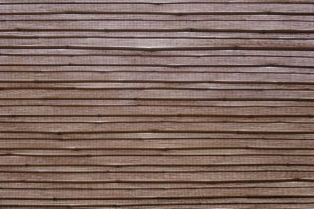 Mesh curtain wattled from ropes and bamboo