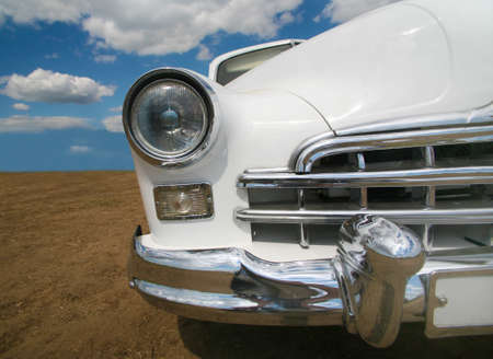 white ancient car on the nature  close upの写真素材
