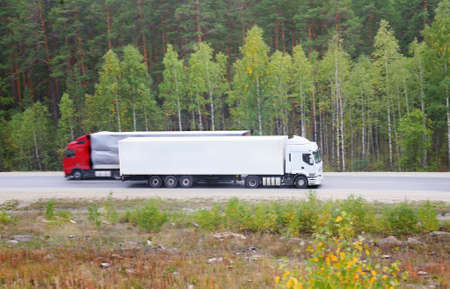 Two trailers go on the way to different directions