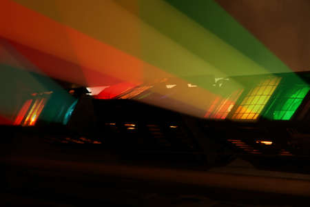 Colour spotlights illumination on scene in the dark
