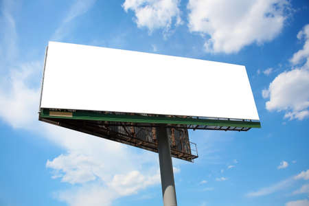 big publicity board outside against skyの写真素材
