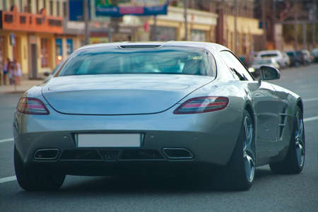 luxury car on the city street on sunsetのeditorial素材