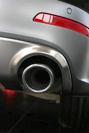 exhaust pipe and back part of new carの写真素材